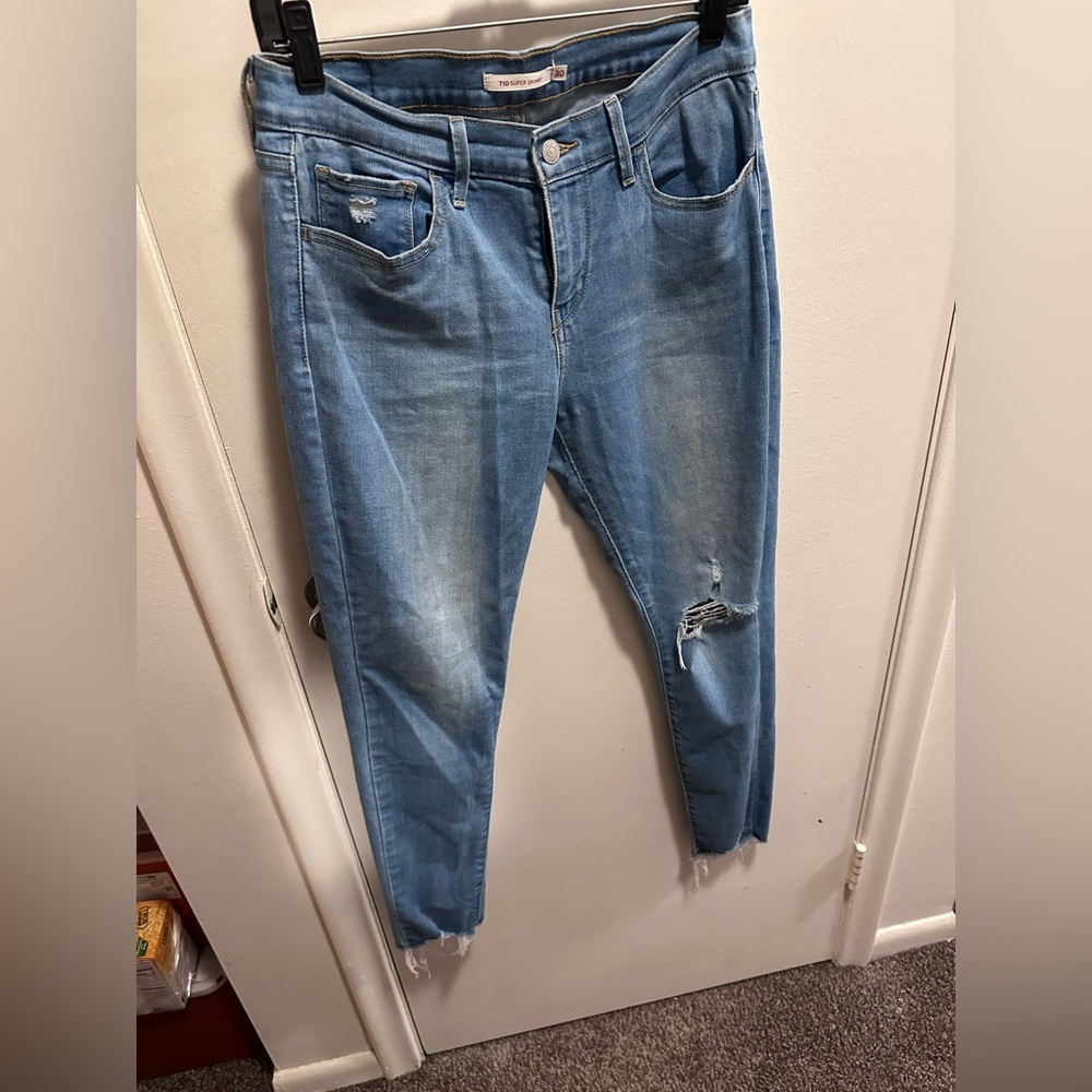 Levi’s 710 skinny jeans. Mid rise